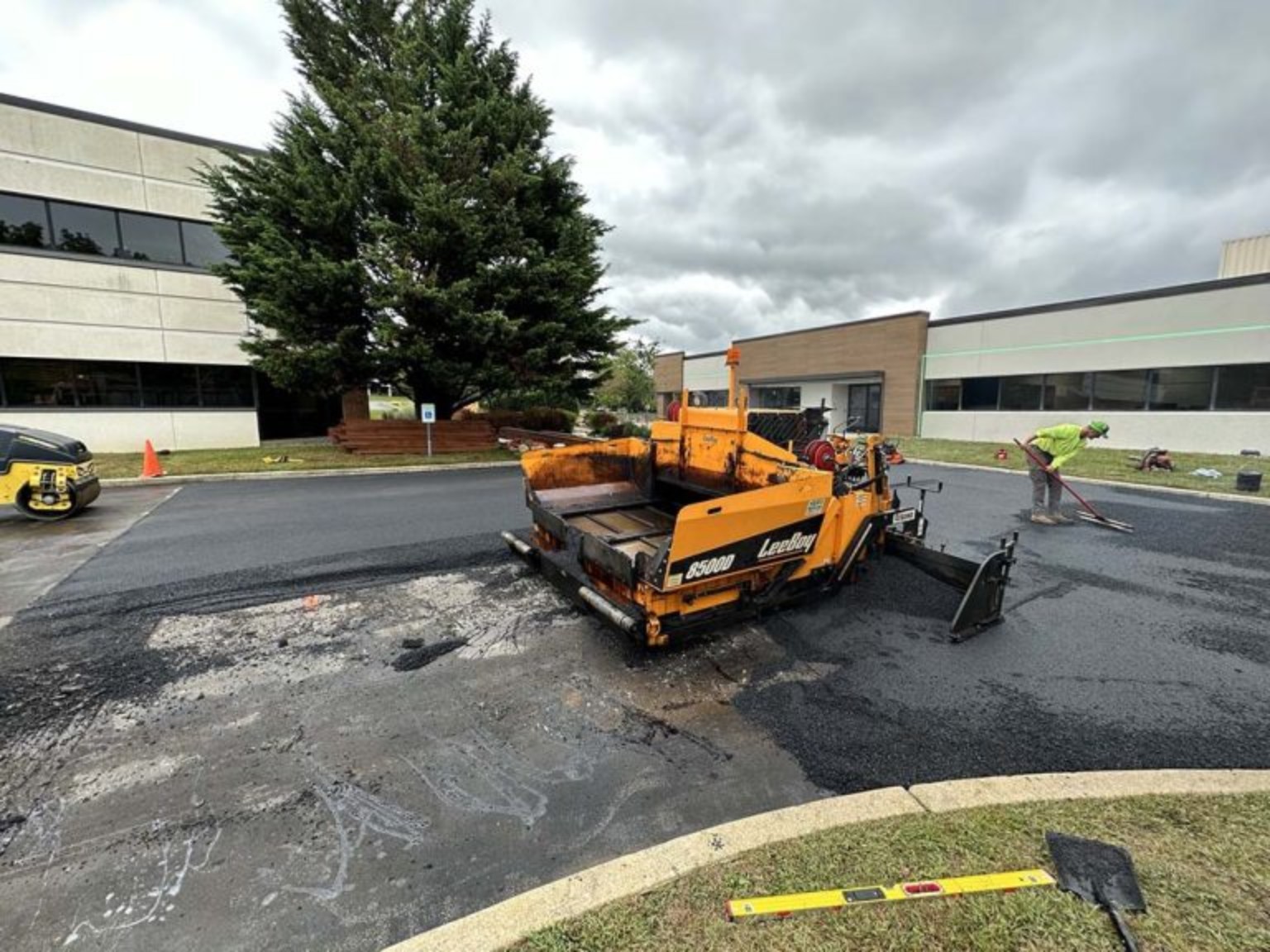 BW Excavation paving crew at an active commercial site